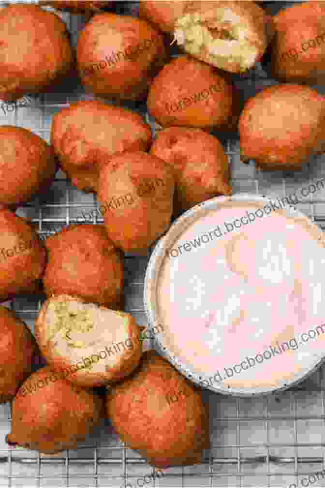 A Basket Of Golden Brown Hush Puppies Served With A Tangy Dipping Sauce Southern Fried: More Than 150 Recipes For Crab Cakes Fried Chicken Hush Puppies And More