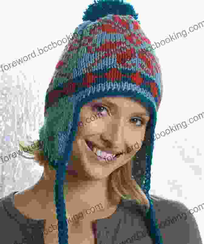 A Cozy And Stylish Knitted Earflap Cap In A Vibrant Shade Of Blue, Adorned With A Playful Pom Pom. Learn To Knit An Earflap Cap