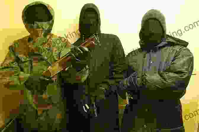A Group Of Masked Individuals Holding Weapons They Called Themselves The K K K : The Birth Of An American Terrorist Group