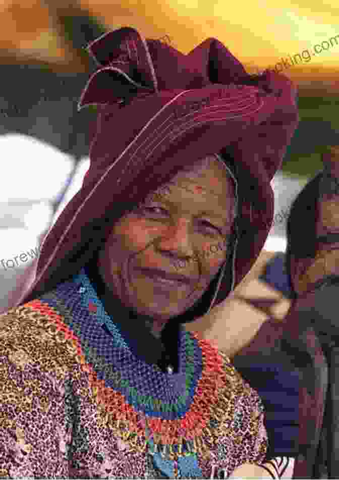 A Portrait Of Nelson Mandela Smiling And Wearing A Traditional Xhosa Hat Nelson Mandela: A Life From Beginning To End