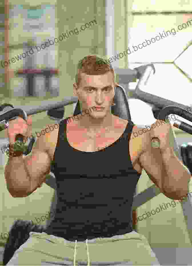 A Young Man Exercising In A Gym For Young Men Only Jeff Feldhahn