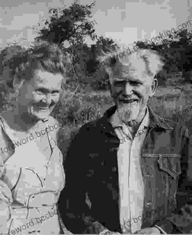 George And Joy Adamson, A Black And White Photograph Of The Couple Sitting Together In A Loving Embrace Living With George Adamson And The Lions Of Kora: A Tale Of Africa Bees And Fear (African And Asian Interludes 1)