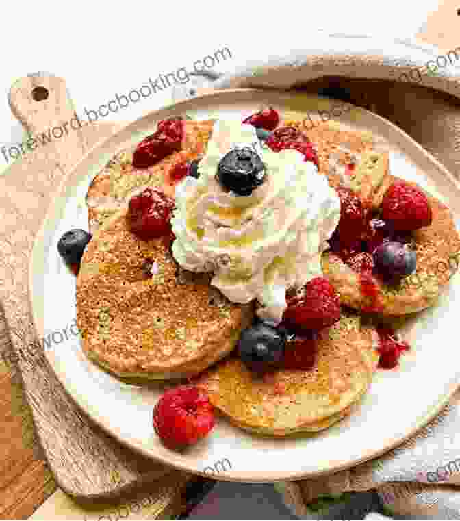 Golden Brown Pancakes Topped With Fresh Berries And Whipped Cream Malibu Farm Sunrise To Sunset: Simple Recipes All Day: A Cookbook